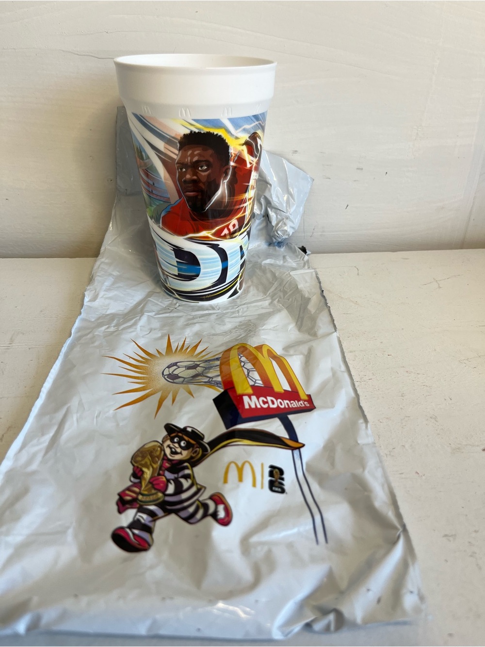 McDonald's White Promotional Cup with Colorful Soccer Graphics